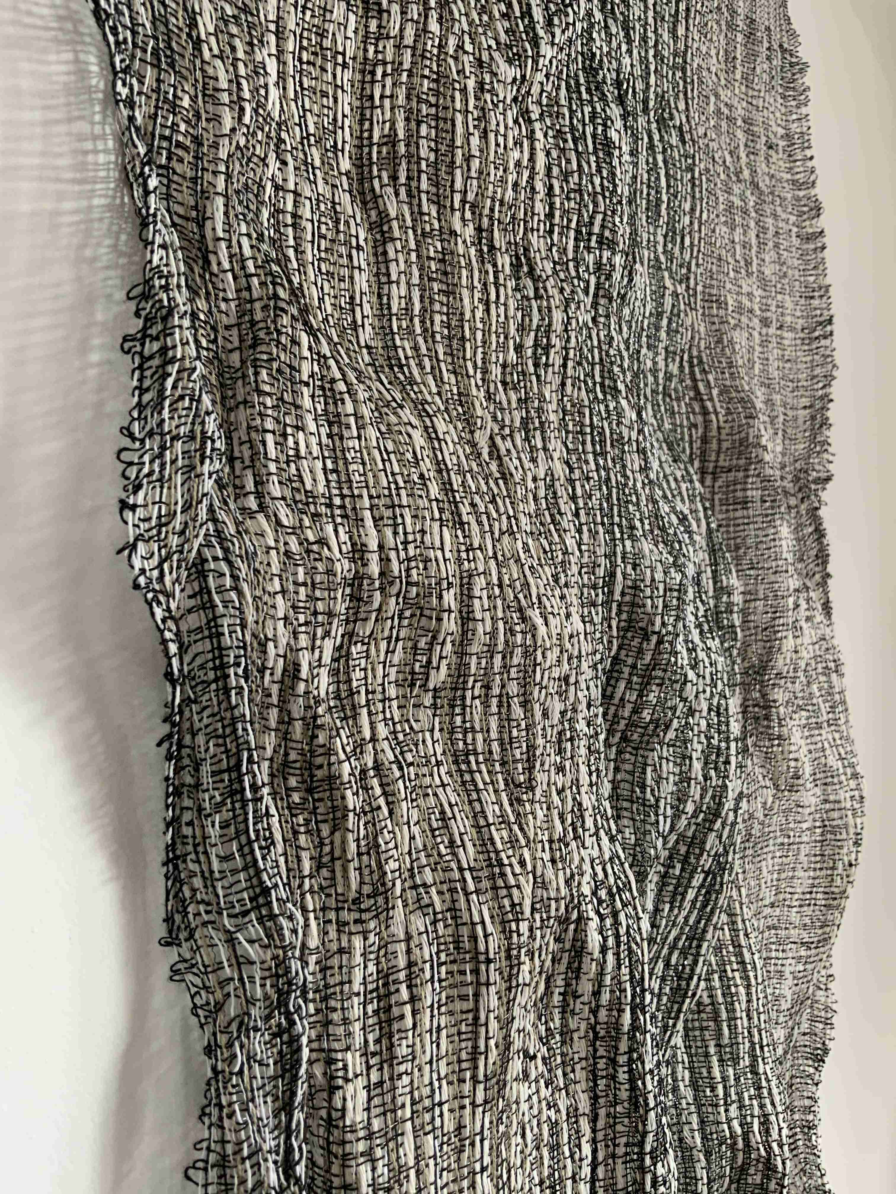 Handwoven metallic yarn