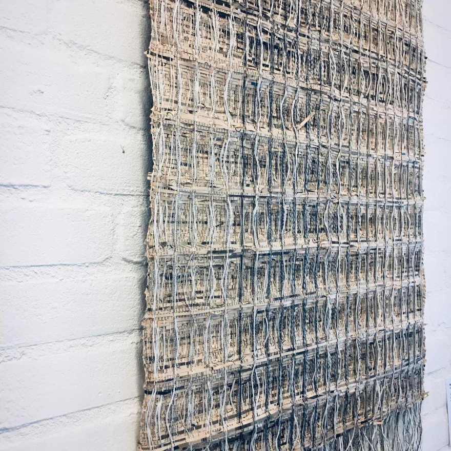 Woven newspaper in honeycomb weave