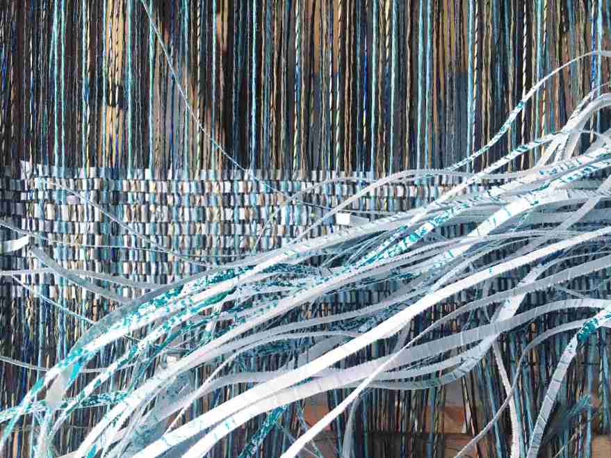Weaving with paper on the loom