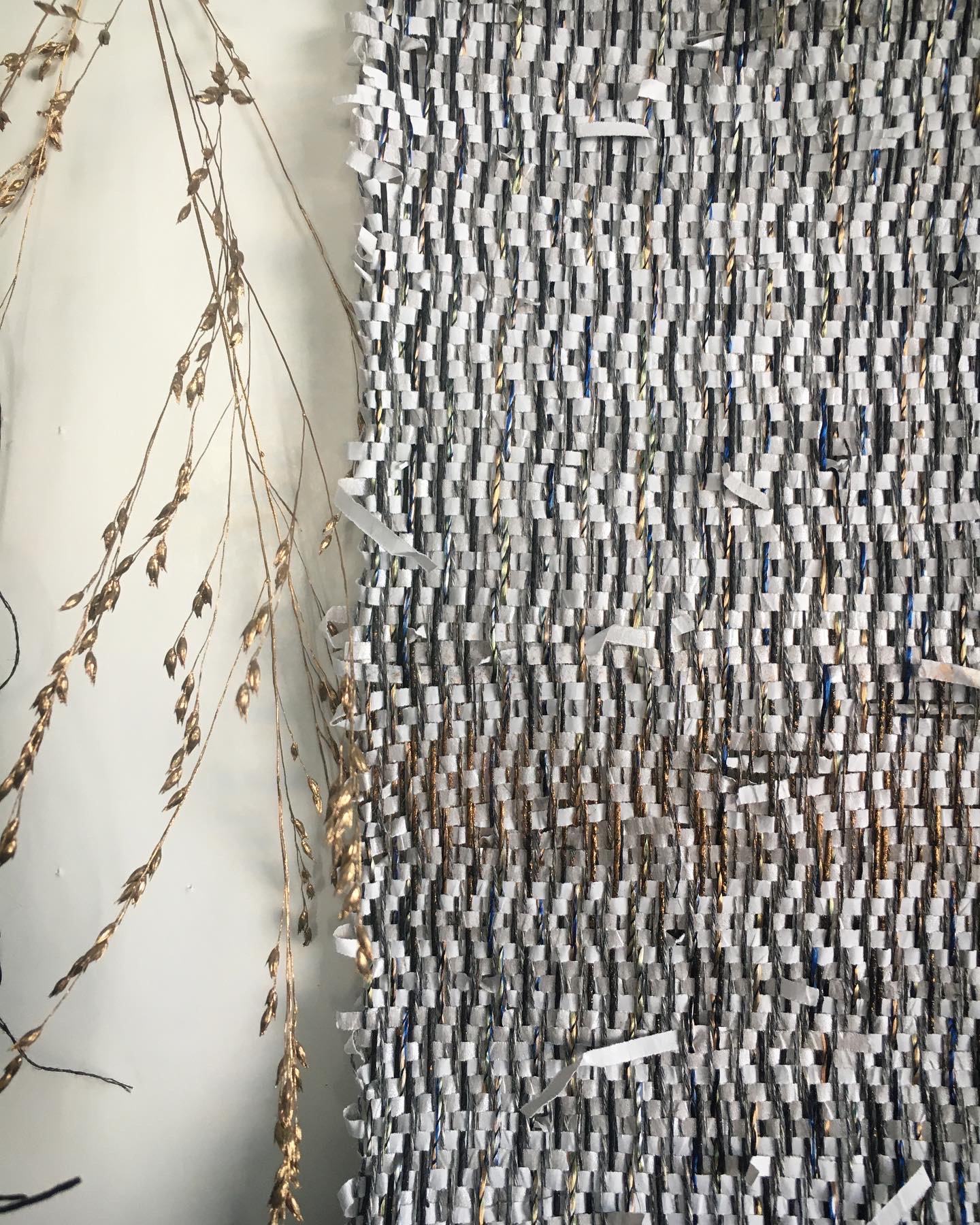 Woven paper with painted warp