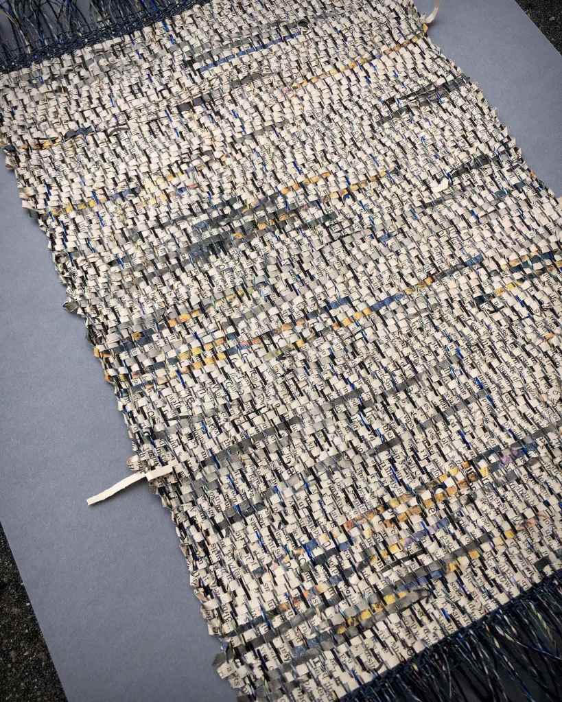 Woven paper mounted on card detail