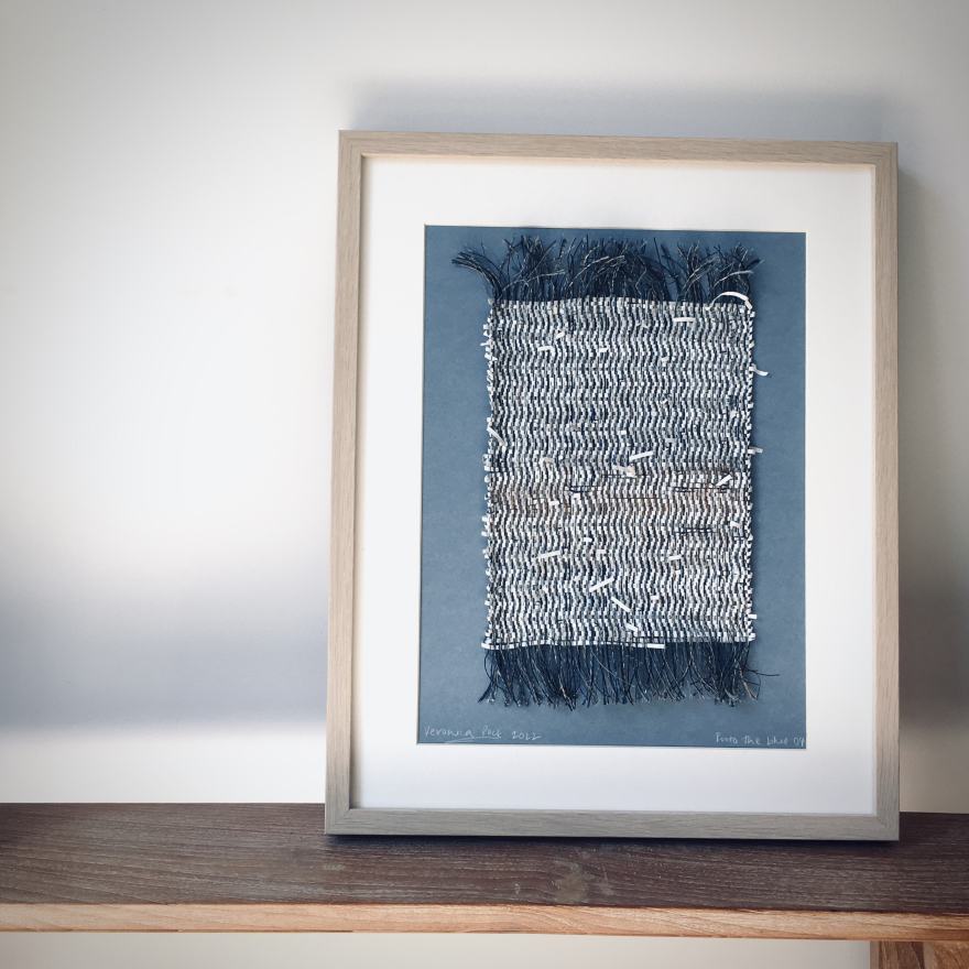 Woven framed piece in blue