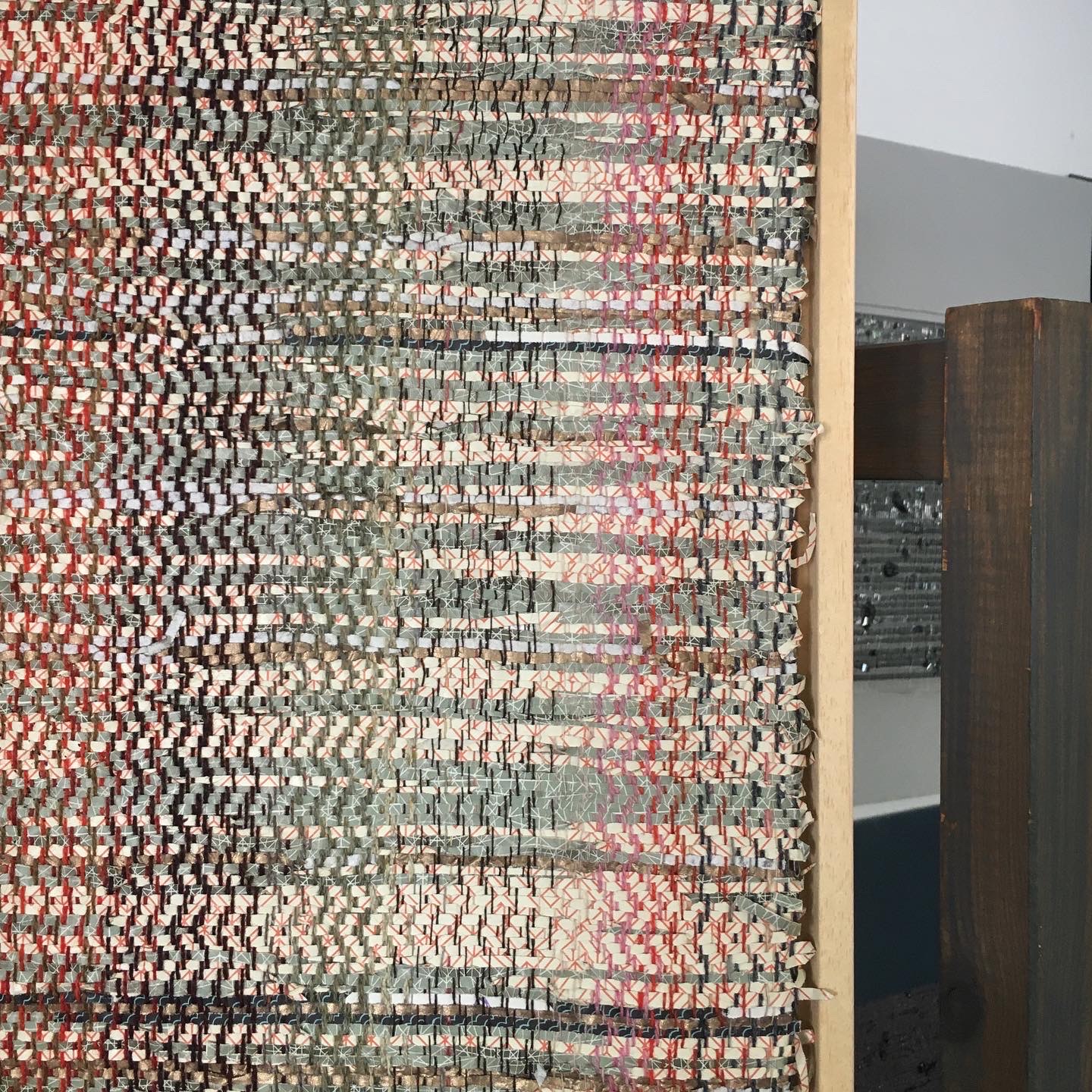 Woven paper with wool warp detail