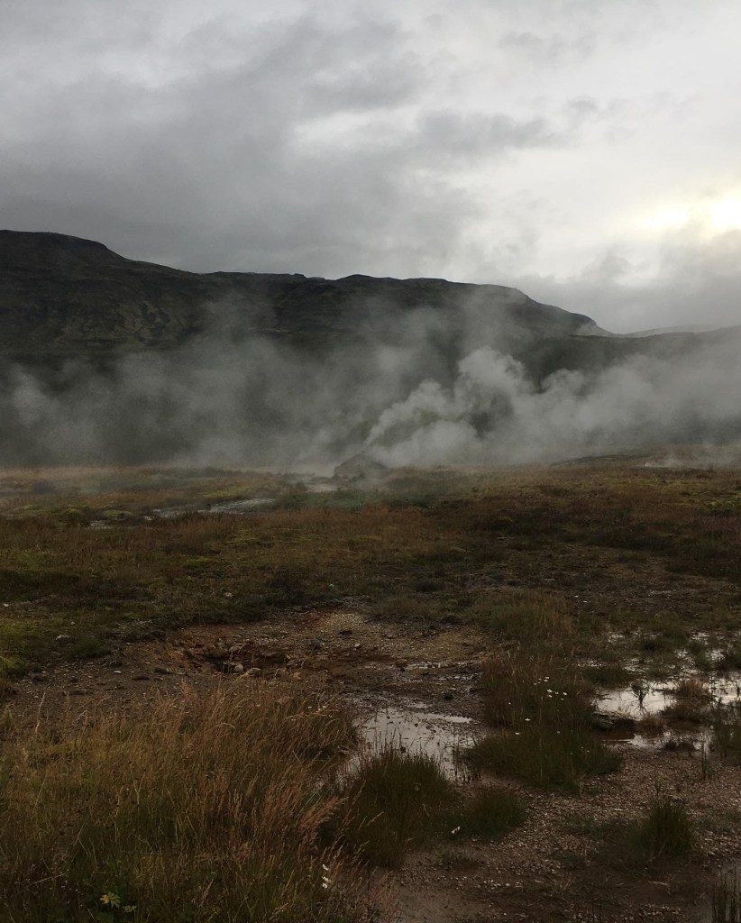 Boiling water streams at Geysir, Iceland