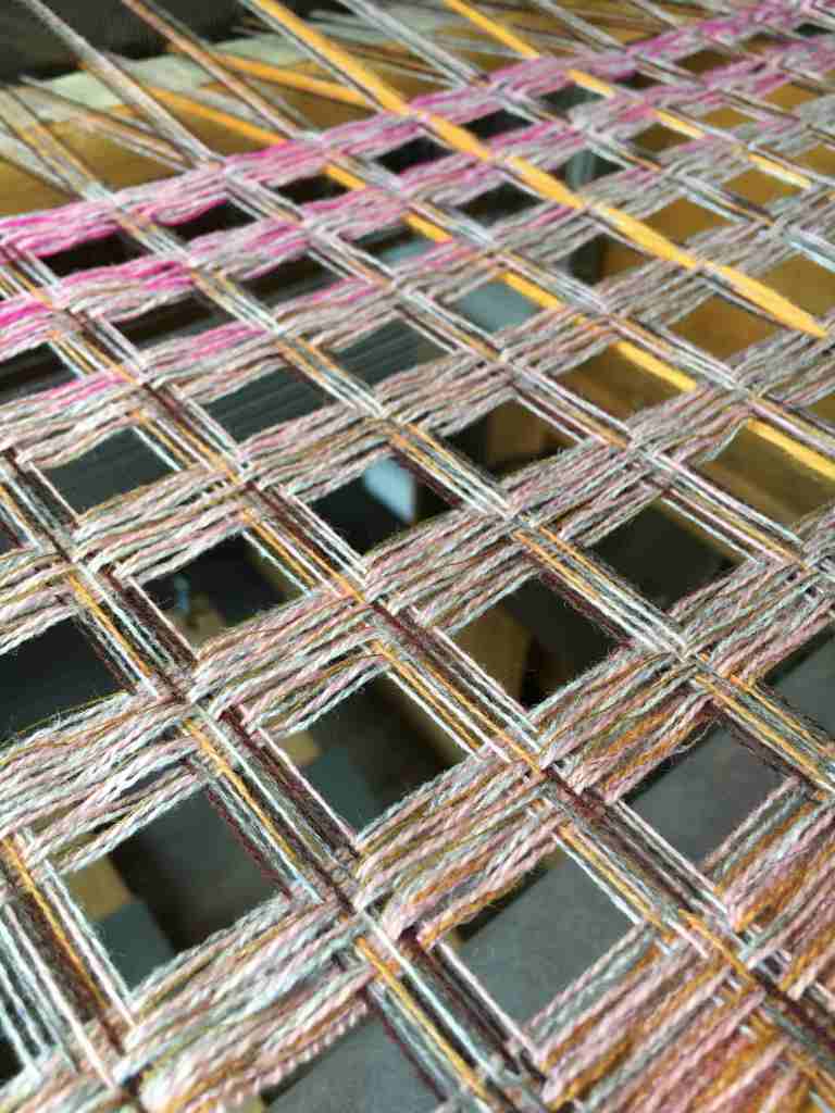 Scarf with breaks on the loom