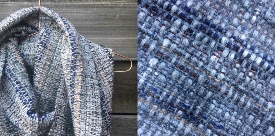 Handwoven scarf in blue and grey with detail of weave pattern