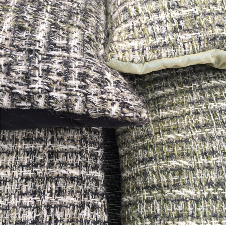 New woven cushions in mossy greens and greys