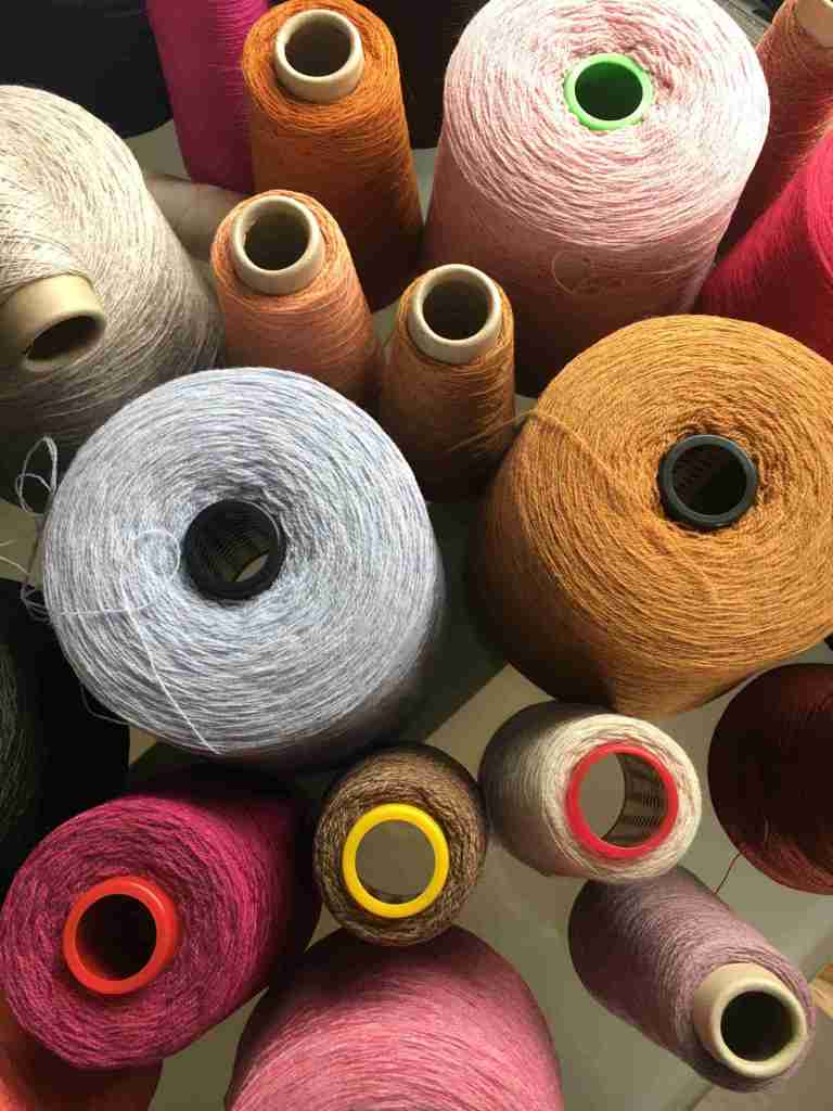 Selection of yarns in pinks, ochres and browns