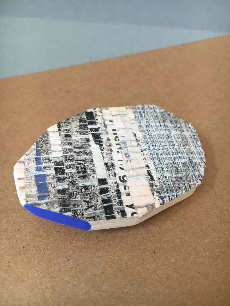 Paper and horsehair brooch detail