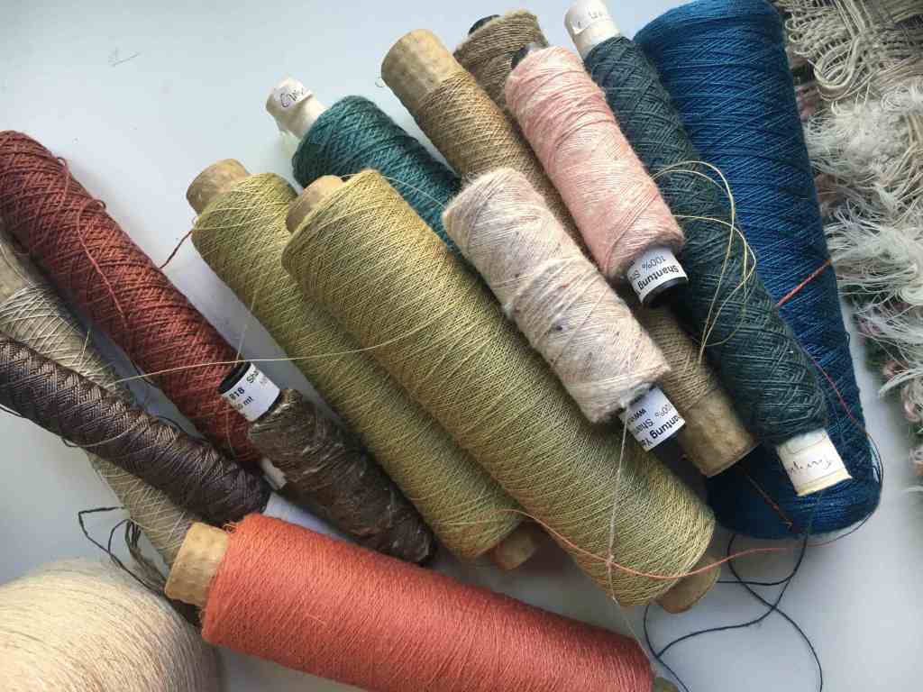 Mixed yarns on studio table