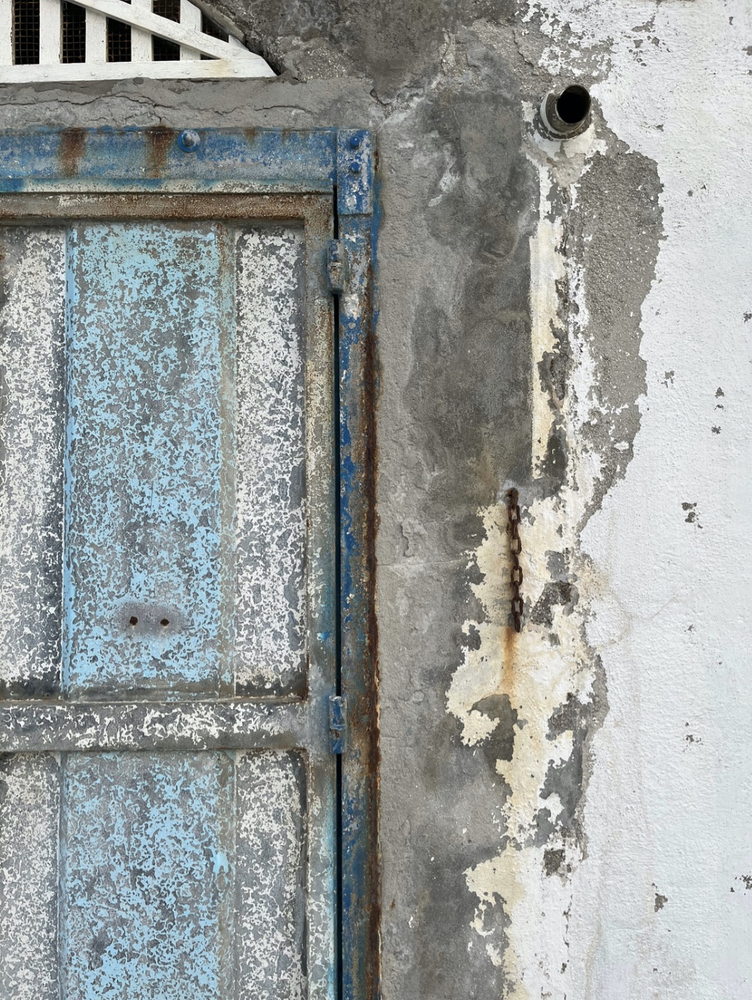 Beach cave door grey blue at Spiaggia del Passetto, Ancona