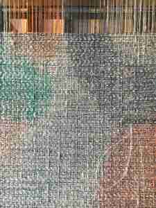 Painted warp on the loom