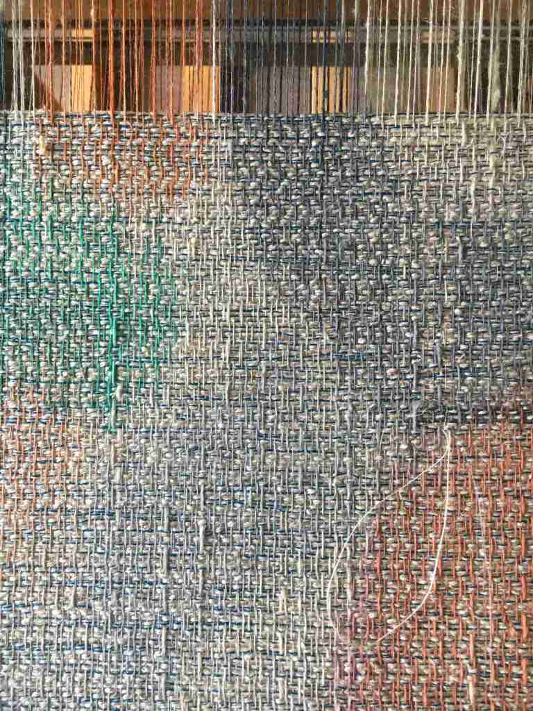 Painted warp on the loom