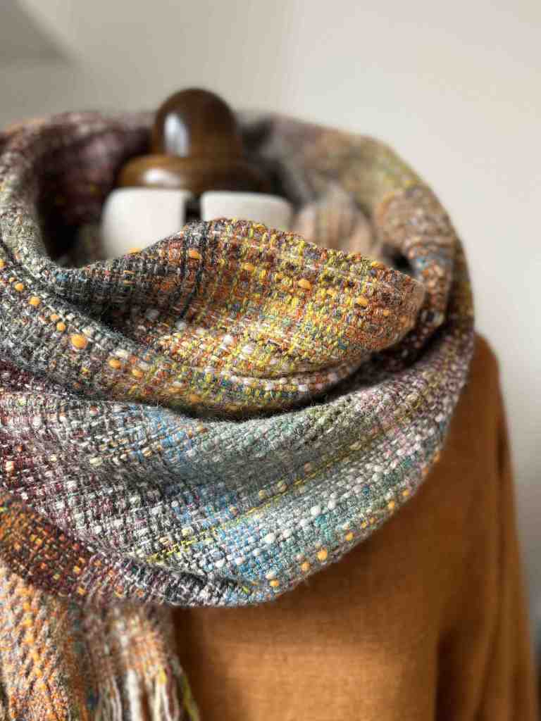 Autumn scarf in blues, yellows and browns