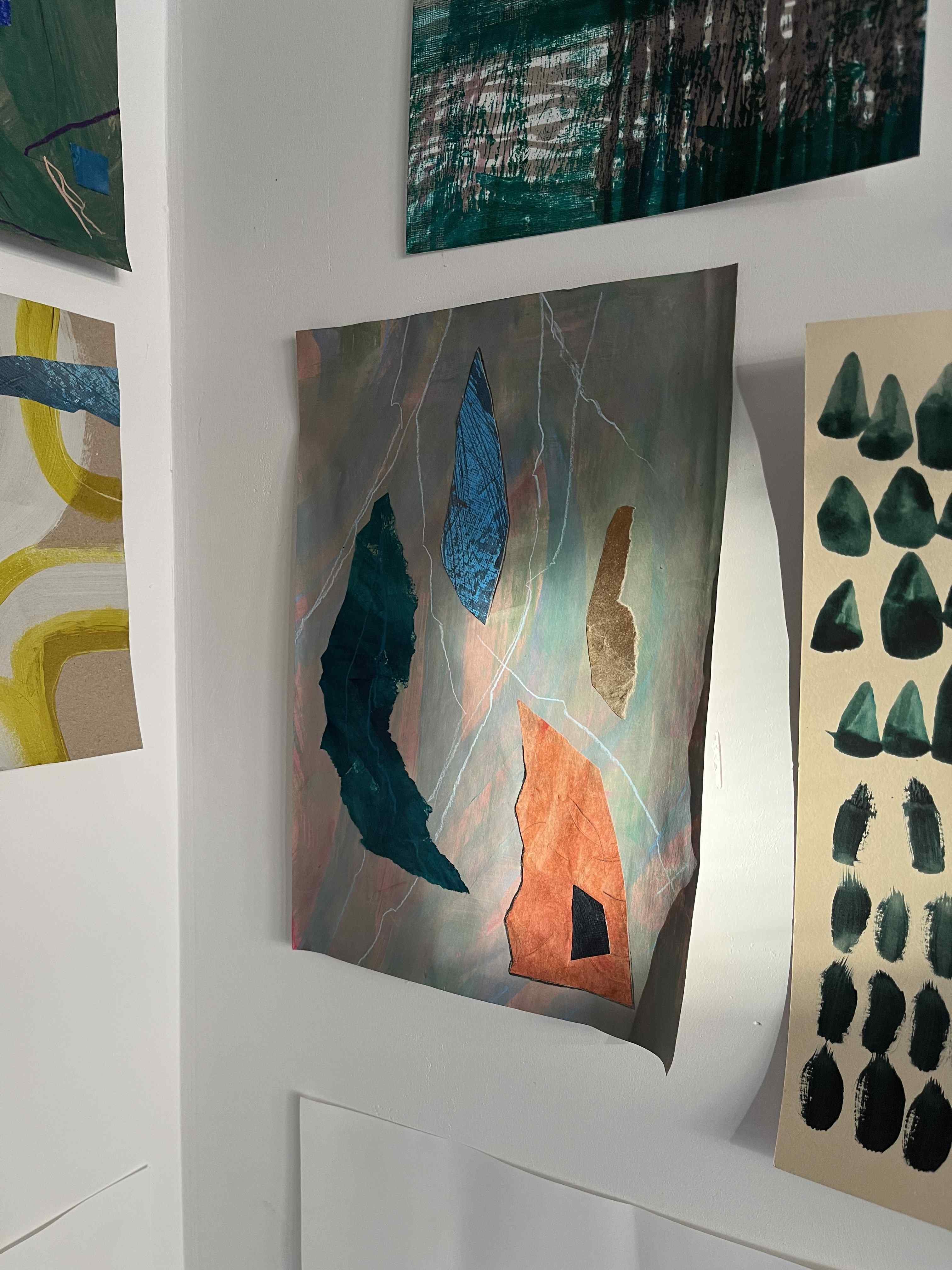 Mixed media work on wall of studio