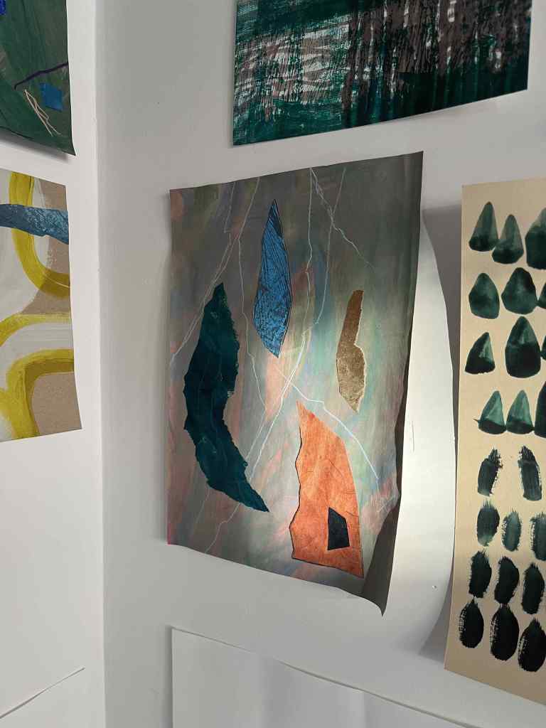 Mixed media work on wall of studio