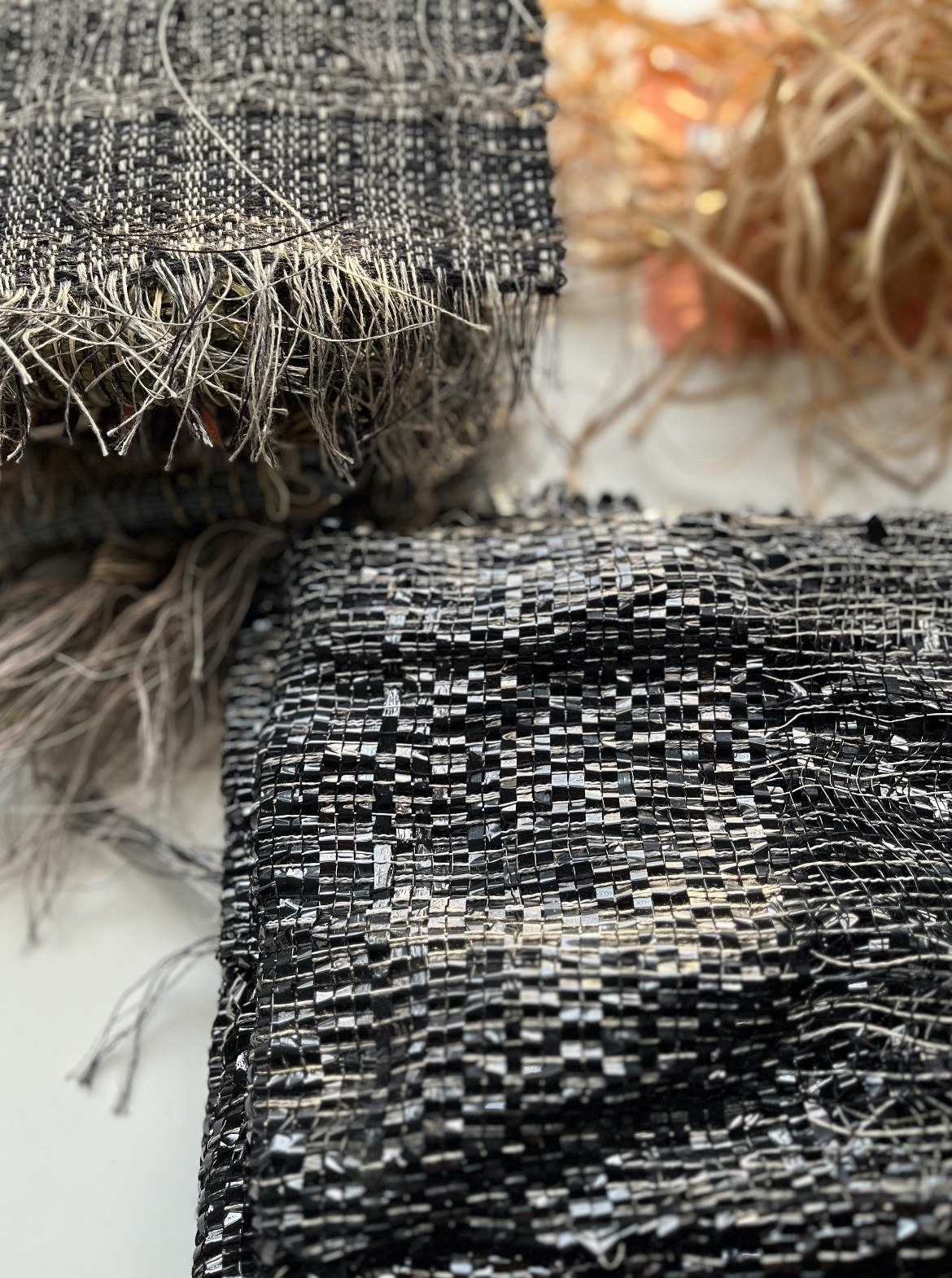 Weavings and materials on the table