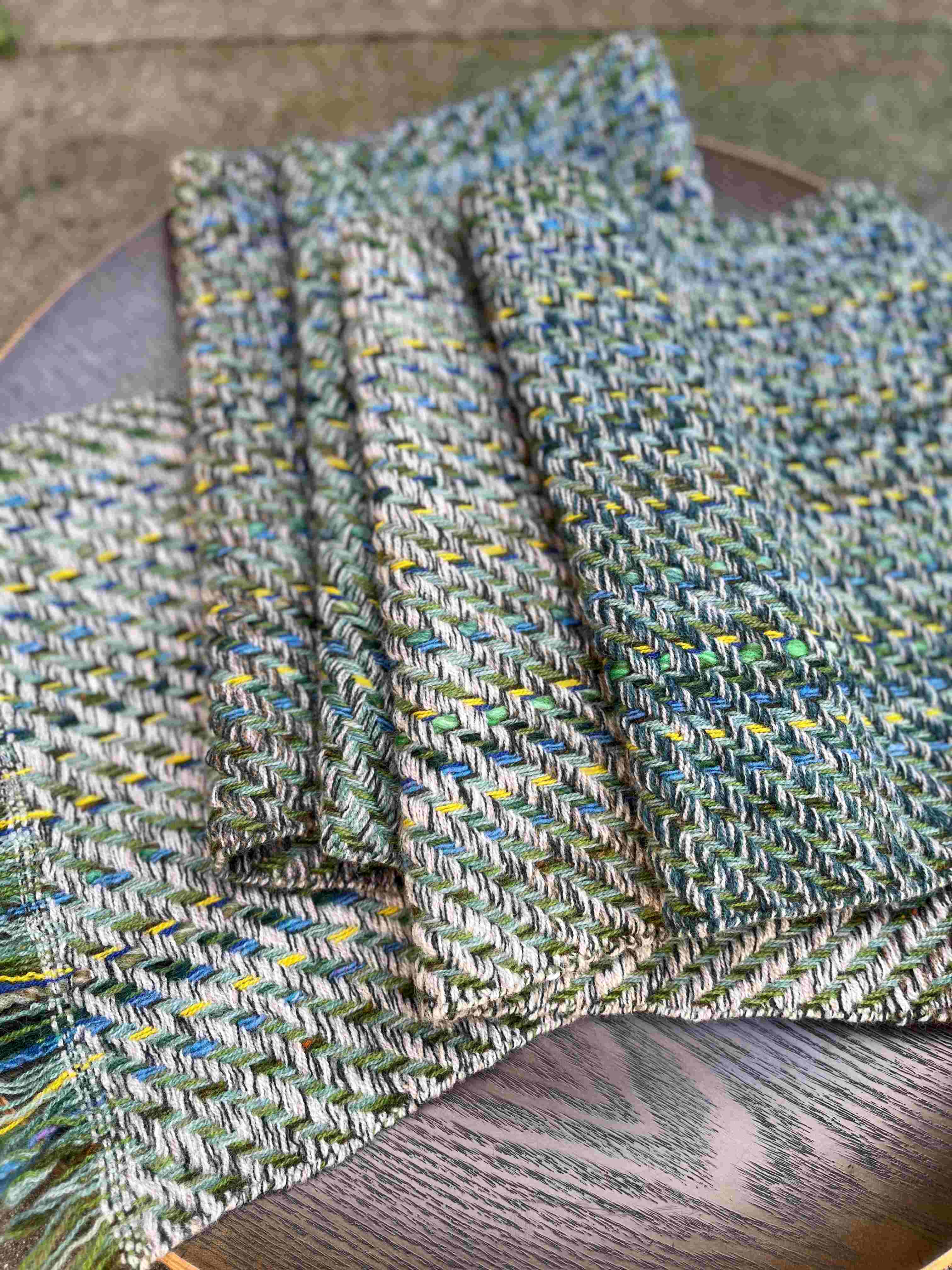 Wool scarf in greens, blues and yellow
