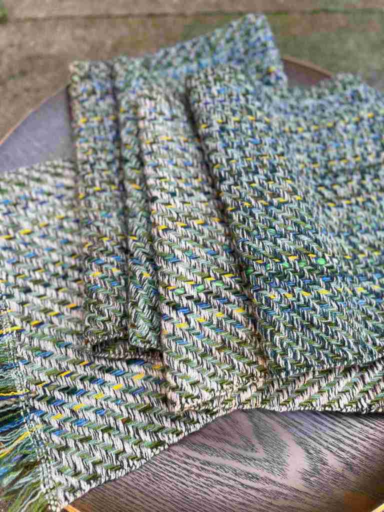 Wool scarf in greens, blues and yellow