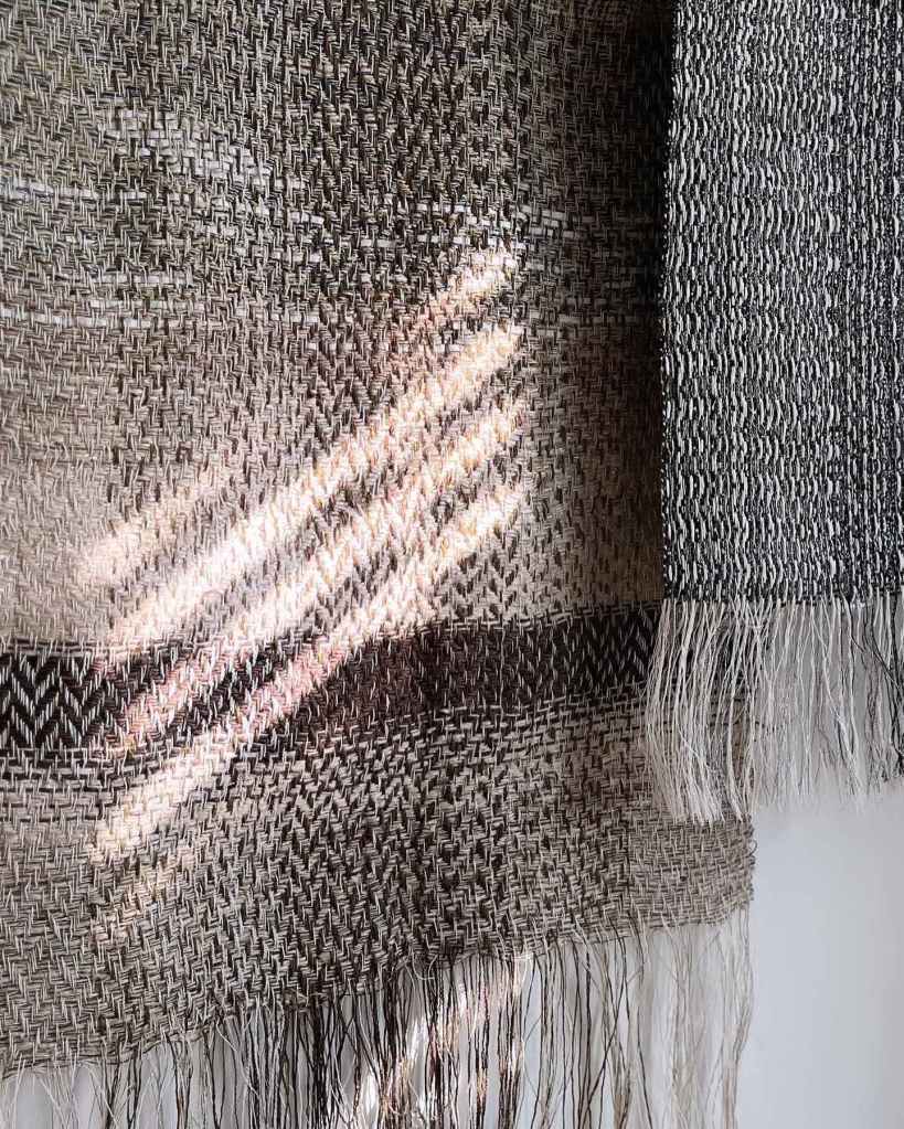 Light catching wall hangings on the studio