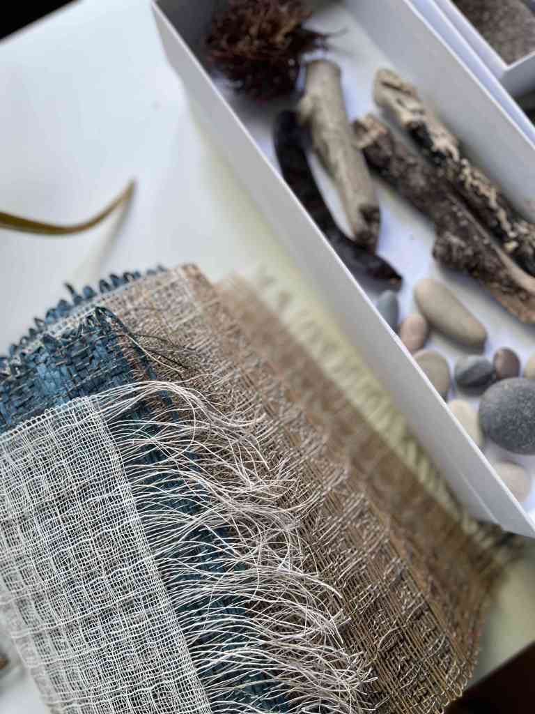 Woven paper samples and collection of beachcombing finds