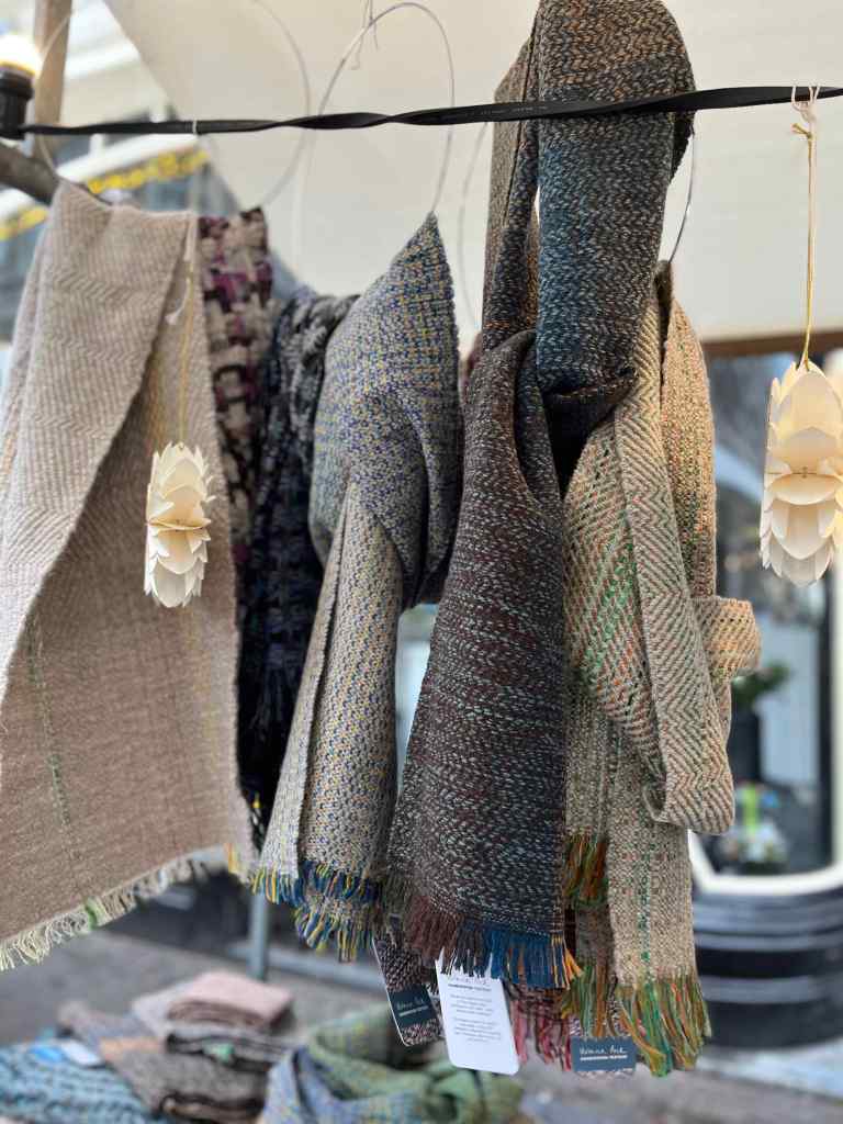 Handwoven scarves at market