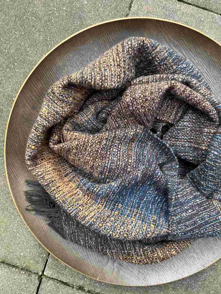 Handwoven lambswool scarf in blues, ochre and grey