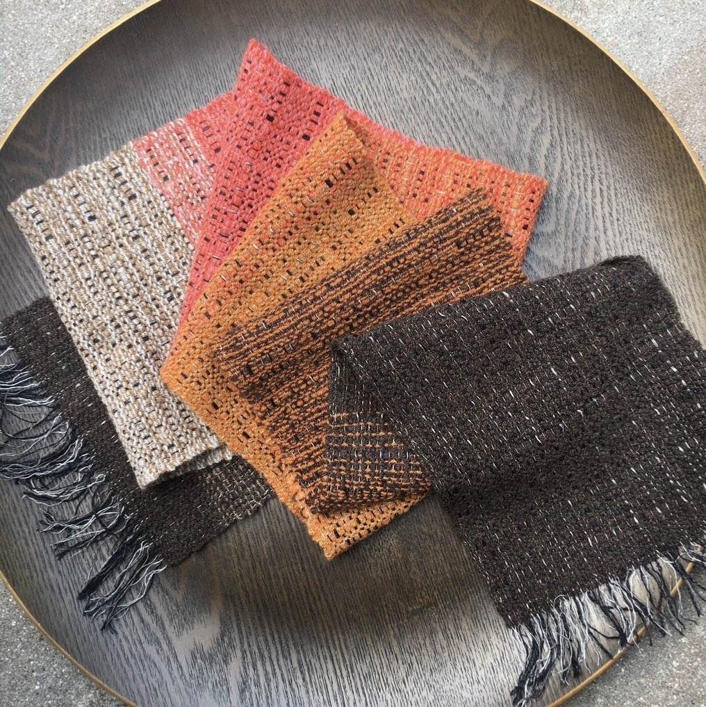 Handwoven linen and lambswool scarf in oranges, browns and ecru