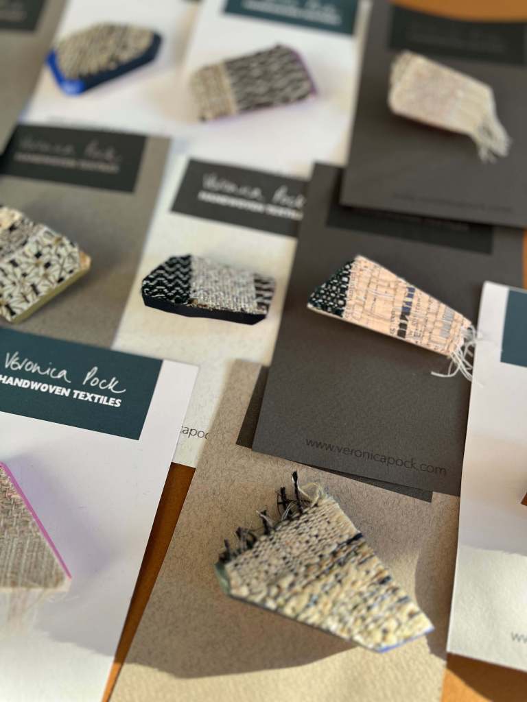 Handwoven wooden-backed brooches