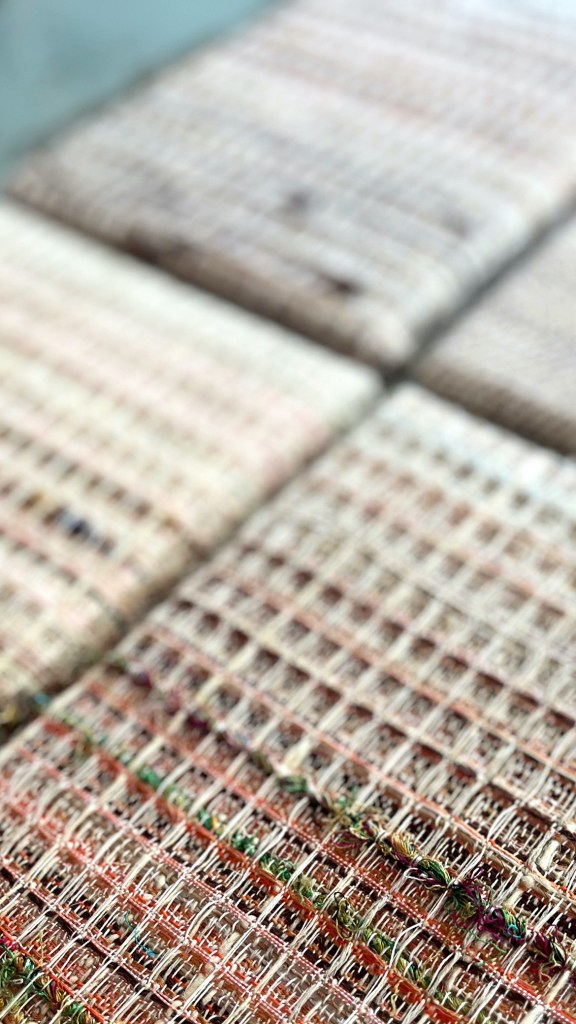 Small woven artworks side by side