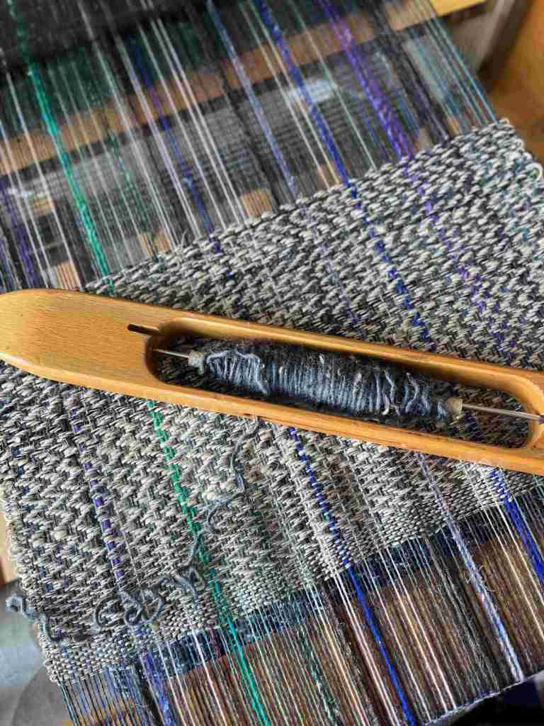 Wool and linen currently on the loom