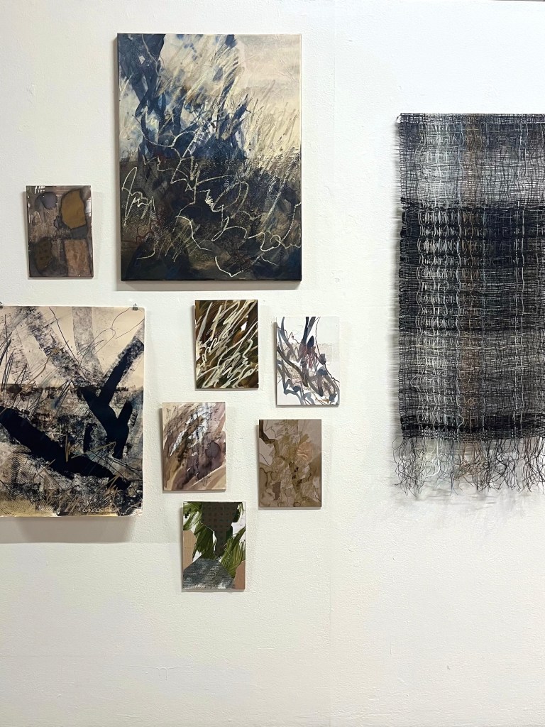 Woven wall hanging and works on board and canvas at IJ Kunstcollectief Amsterdam